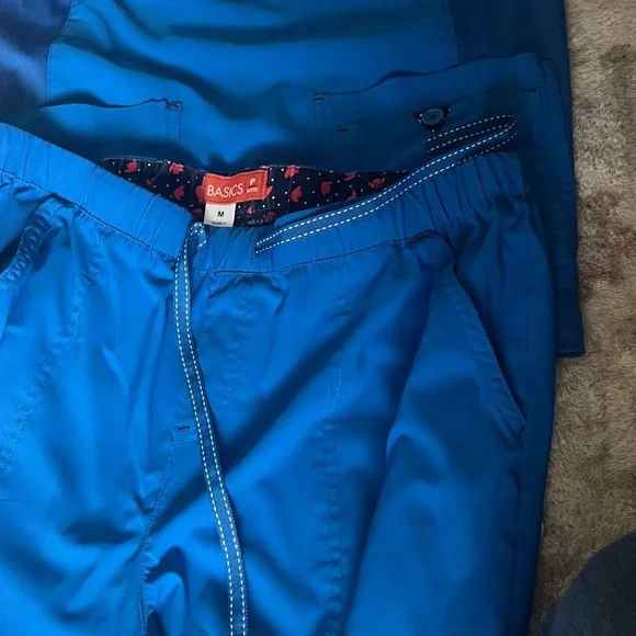 Royal Blue Scrub Set with Floral Lining by Koi - Picture 3 of 5